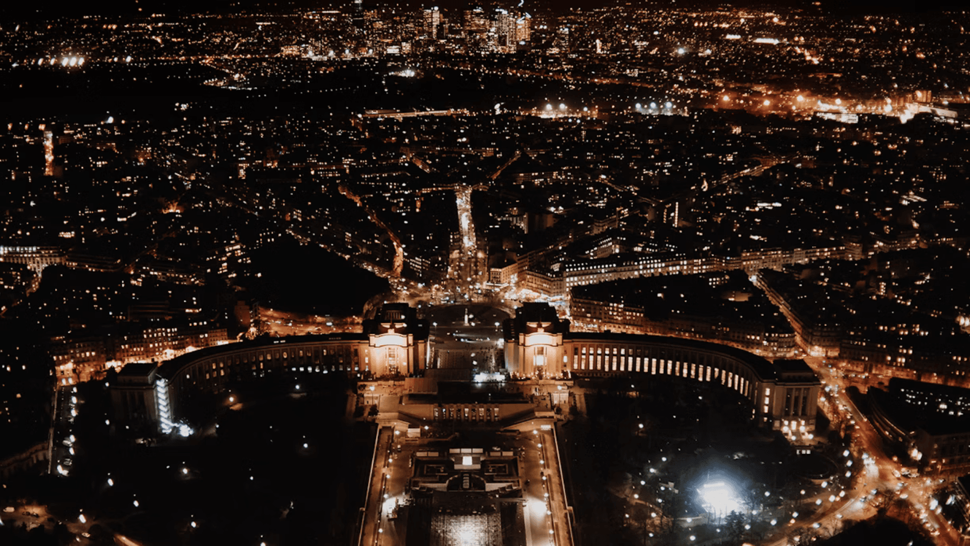 View of Paris at night from the top of the Eiffel Tower