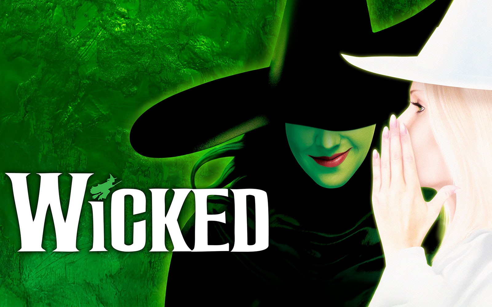 Wicked musical poster with green witch and whispering figure.